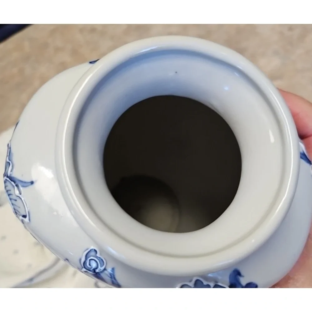 Blue and White Vase with Roses, Roses are outlined in the pottery so they show